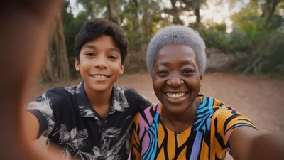 Grandmother and Grandson Taking A Selfie Outdoors