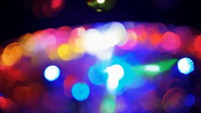 Abstract Bokeh Lights Flashing In Nightclub Setting