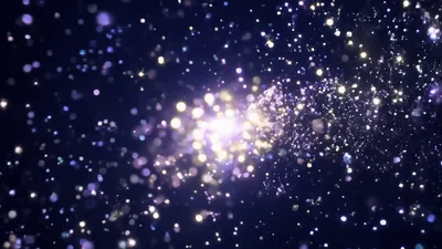 Abstract Glowing Particles Floating In Dark Space