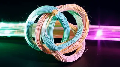 Abstract Pastel Fiber Optic Knot Glowing With Light