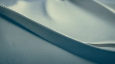 Abstract Light Blue Fabric Rippling In Slow Motion