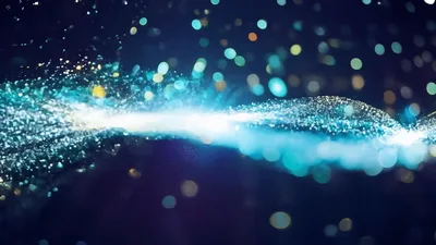 Abstract Golden And Teal Particle Wave Motion Background