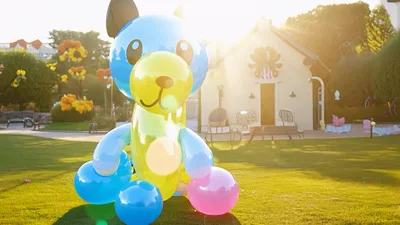 Inflatable Balloon Bear Standing In A Sunny Park