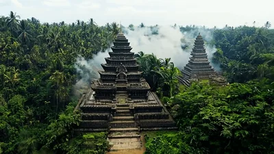 Aerial View Of Ancient Balinese Temple In Lush Jungle