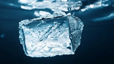 Large Diamond Floating Underwater With Bubbles Rising