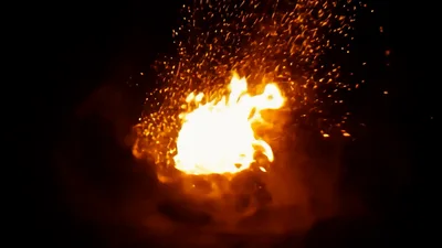 Glowing Fireball Transforming Into A Magical Blue Energy Sphere