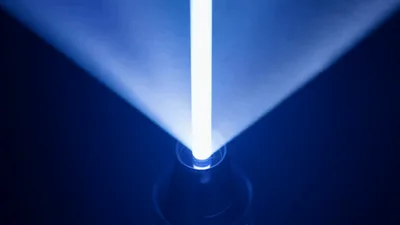 LED Light Stick Changing Colors In Dark Studio