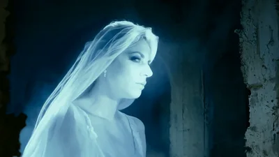 Ghostly Woman In White Veil Appearing In Ruined Building