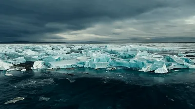 Aerial View Of Arctic Ice Floes At Sunset