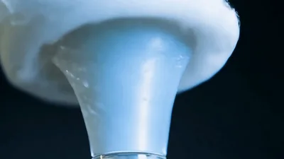 Dry Ice Vapor Flowing Over A Glass Rim