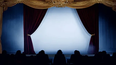 Red Theater Curtains Opening To Reveal Empty Stage