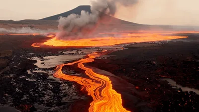 Aerial View Of Molten Lava Flowing From Volcanic Eruption