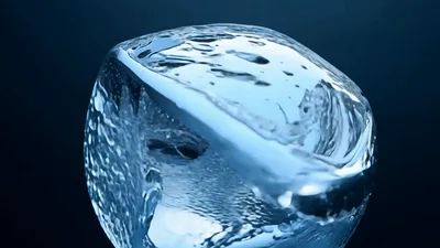 Liquid Water Sphere Morphing Into A Cube
