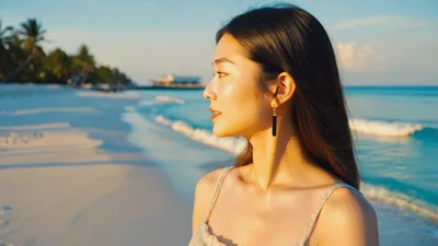Young Asian Woman Looking At The Tropical Beach