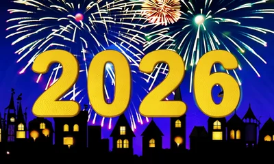 New Year 2026 Celebration With Fireworks Over Silhouette Town