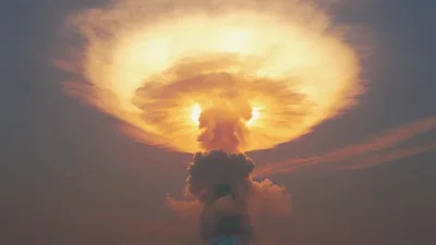 Massive Nuclear Explosion Mushroom Cloud Rising In Sky