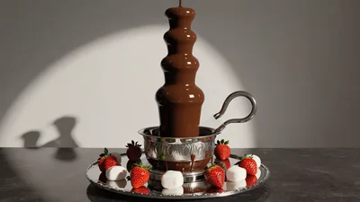 Chocolate Fountain Flowing With Strawberries And Marshmallows