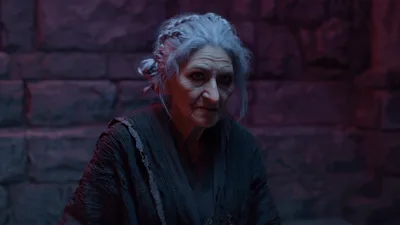 Elderly Woman With Braided Hair Looking Intently