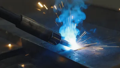Industrial Metal Welding Process With Bright Sparks
