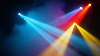 Dynamic Stage Lighting Beams Moving In Dark Atmosphere