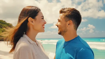 Happy Couple Laughing Together on a Tropical Beach