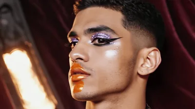 Androgynous Male Model With Artistic Makeup Posing
