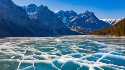 Aerial View Of Frozen Lake With Cracks