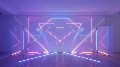 Abstract Neon Light Installation Changing Colors In Studio