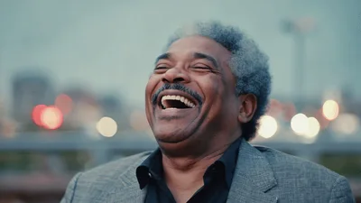 Mature African American Man Laughing Outdoors
