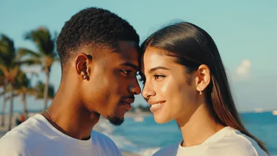 Young Couple Gazing Lovingly At Each Other On Beach