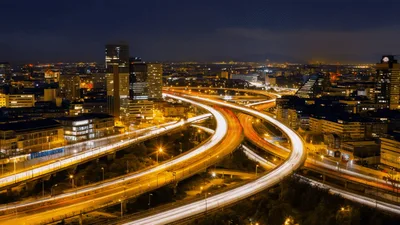 Time Lapse Of Busy Highway Interchange At Night