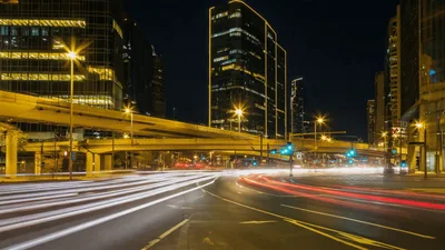 Nighttime City Intersection With Long Exposure Traffic Light Trails
