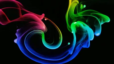 Colorful Liquid Ink Swirls In Dark Fluid