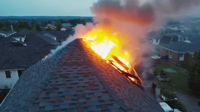 Residential House Roof Engulfed In Intense Fire