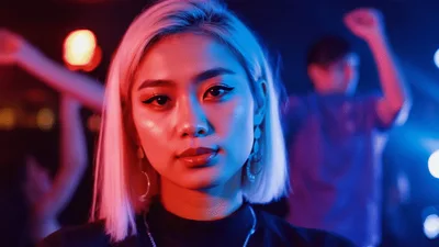 Young Asian Woman Dancing In A Nightclub