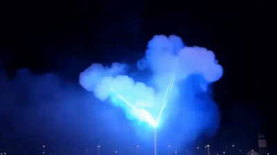 Colorful Laser Light Show With Smoke Effects At Night