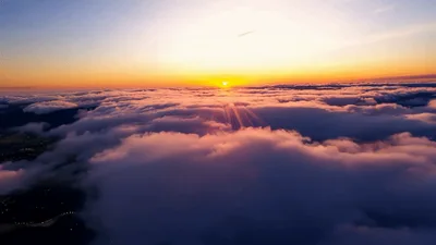 Aerial View Of Sunset Above Thick Cloud Layer