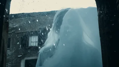 Ghostly Woman With Skull Makeup Appearing Through Foggy Window