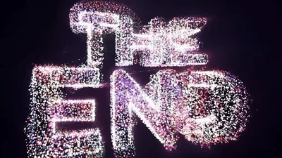 The End Text Animation With Colorful Particle Explosion