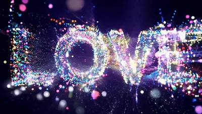 Colorful Particle Animation Forming The Word Love