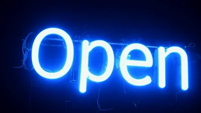 Bright Blue Neon Open Sign Flickering On