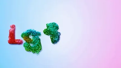 LGBTQ Plus Text Animation With Colorful Particle Explosion