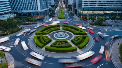 Time Lapse Of Traffic Flowing Through A City Roundabout