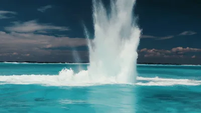 Large Water Splash Erupting In Tropical Ocean