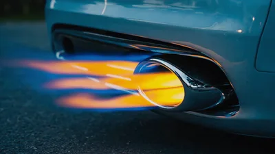 Car Exhaust Pipe Shooting Blue And Orange Flames