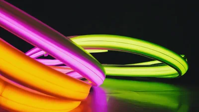 Glowing Neon Tubes Forming Abstract Geometric Shapes