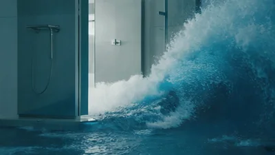 Large Ocean Wave Crashing Inside A Modern Bathroom