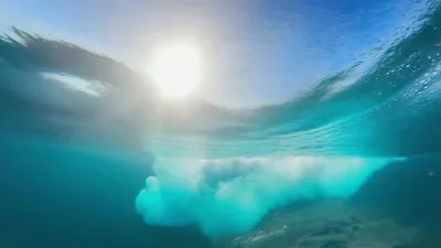 Underwater View Of A Breaking Ocean Wave