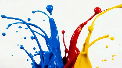Blue Red And Yellow Paint Splashes Against White Background