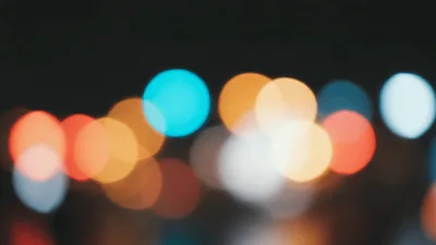 Abstract Blurred City Traffic Lights At Night